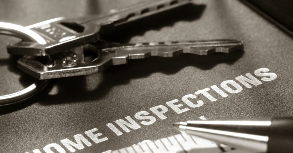 Image of Keys, Pen, And Home Inspection