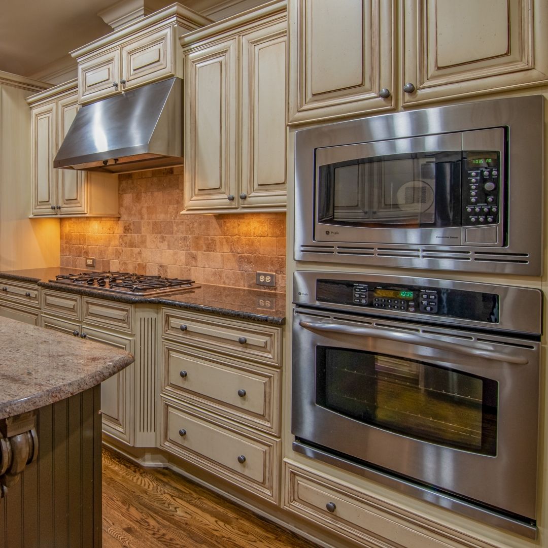 rustic looking kitchen with new appliances